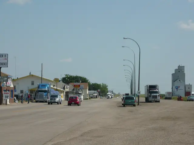 Highway 11 business strip with grain elevator, Chamberlain